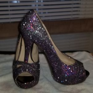 Guess designer high heals size 8 1/2 purple sparkly. 6 in heel.